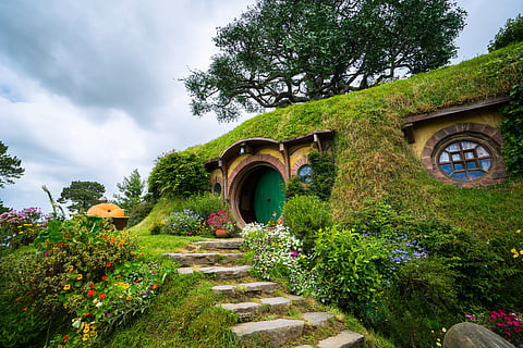 The Hobbiton movie set created for filming The Lord of the Rings and The Hobbit movies in North Island, New Zealand.
