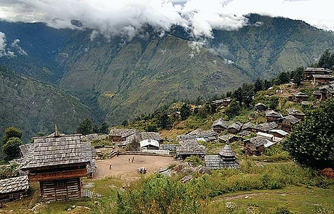 DAY 1 We walked past well-kept mountain villages and small fields. We requested a villager to give us chillies from her fields without a moment's hesitation, the family plucked enough to last us the trek, refusing to accept any money in return. By late 