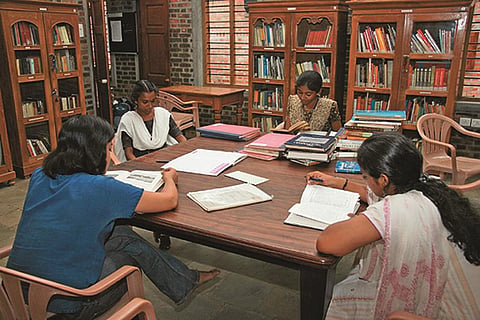 Madras Craft Foundation Library which has Laurie Baker brickwork and terracotta flooring