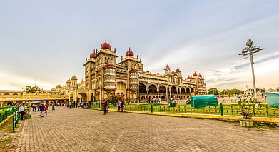 Shutterstock : Designed by Henry Irwin, the Mysore Palace is dominated by domes, turrets and colonnades