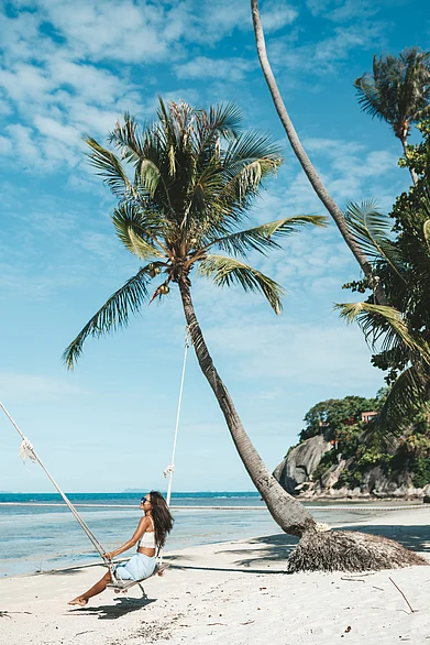 Shutterstock : A woman enjoy a time of langour at the beachside (representative image)