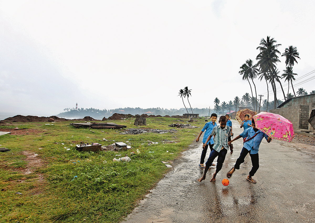 Kids enjoying the monsoons in Kerala