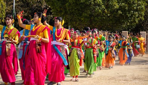Dancers celebrating holi traditionally in Santiniketan and Bolpur