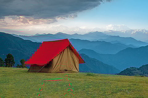 A tent against the Chaukhamba Peak