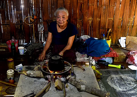 Chowkim's mother at her house in Wagun village.