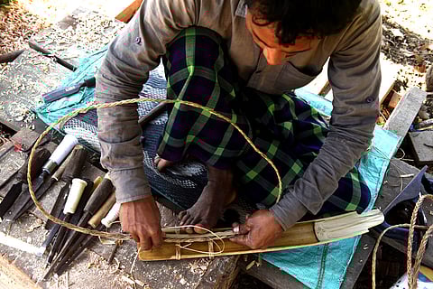 Doung engrossed in his craft