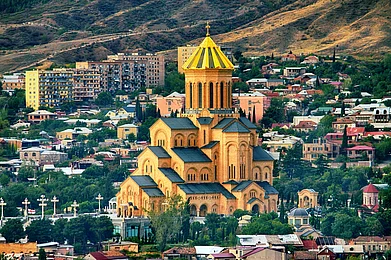 Shutterstock : An aerial view of the Holy Trinity Cathedral in Tbilisi, Georgia