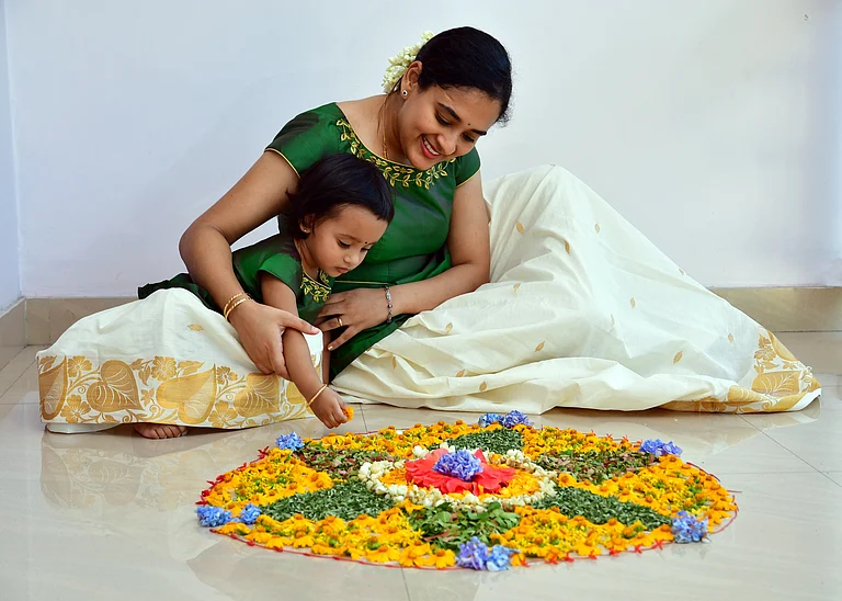 Pookalam is an essential part of Onam festivites - Shutterstock