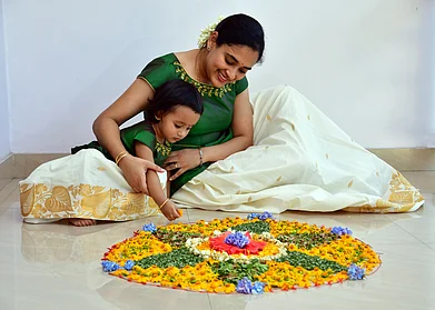 Shutterstock : Pookalam is an essential part of Onam festivites