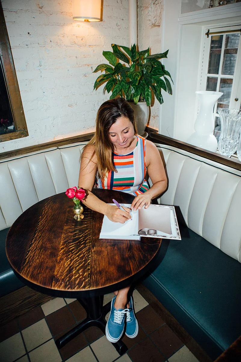 Parla at a book signing event