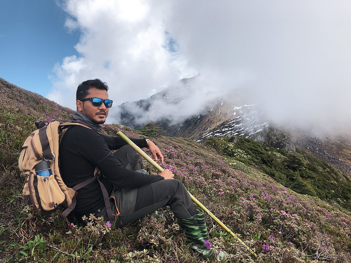 Nisarg Behera resting amid the trek