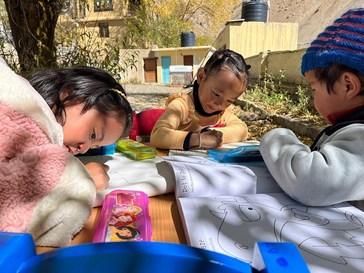 Students enjoying a drawing session at the school