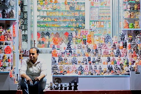 A shop comprising Idols and items for religious offerings in Varanasi
