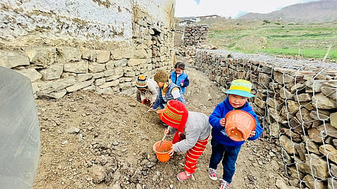 Children learning gardening at the residential school