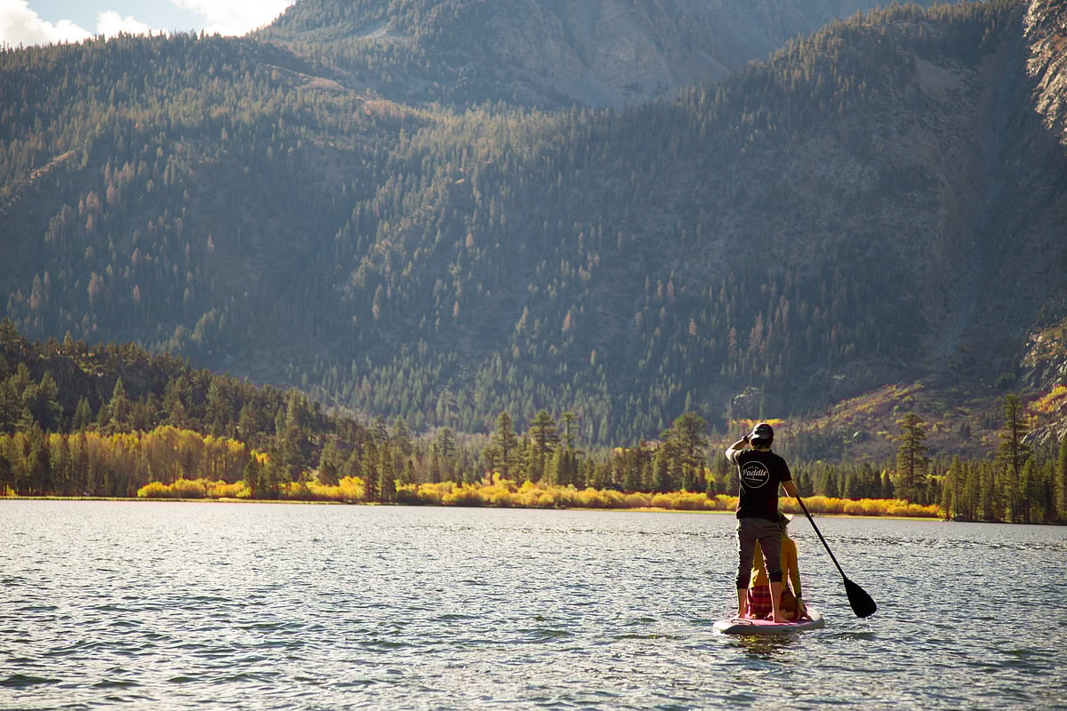 Explore the Lakes Basin by paddleboarding 