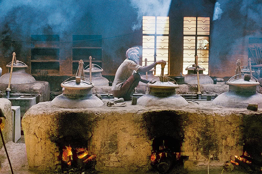 Getty Images : The distillation process for mitti attar, deg-bhapka, has remained unchanged through the years