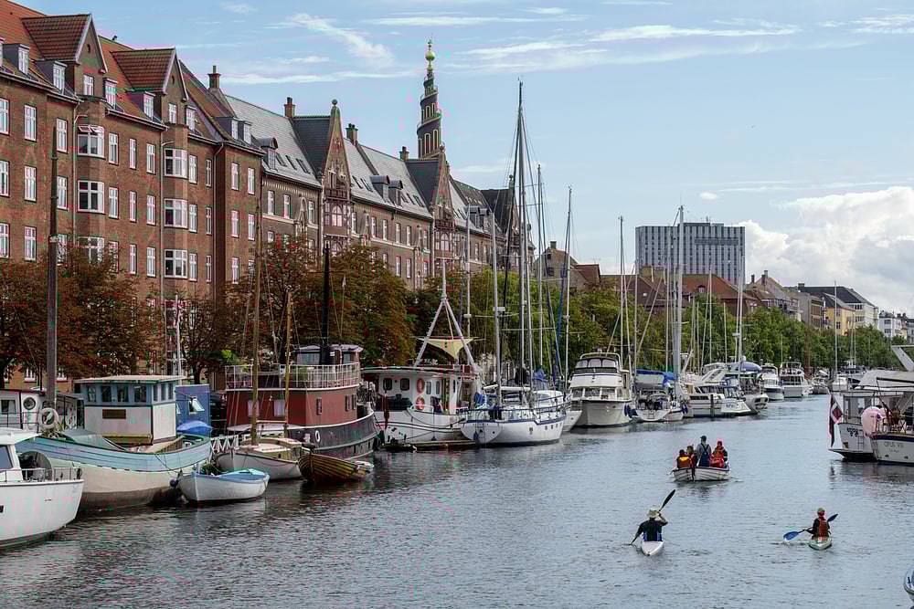 A canal lined with historical buildings in Christianshavn 