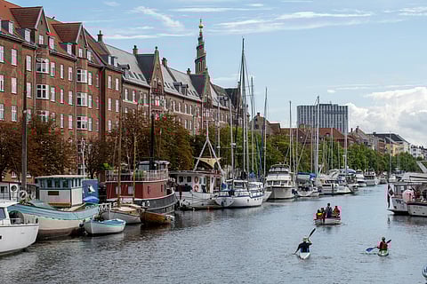 A canal lined with historical buildings in Christianshavn 
