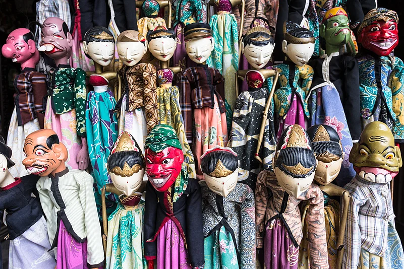 Traditional Javanese wooden puppets called Wayang are avaialble at Jalan Surabaya Flea Market