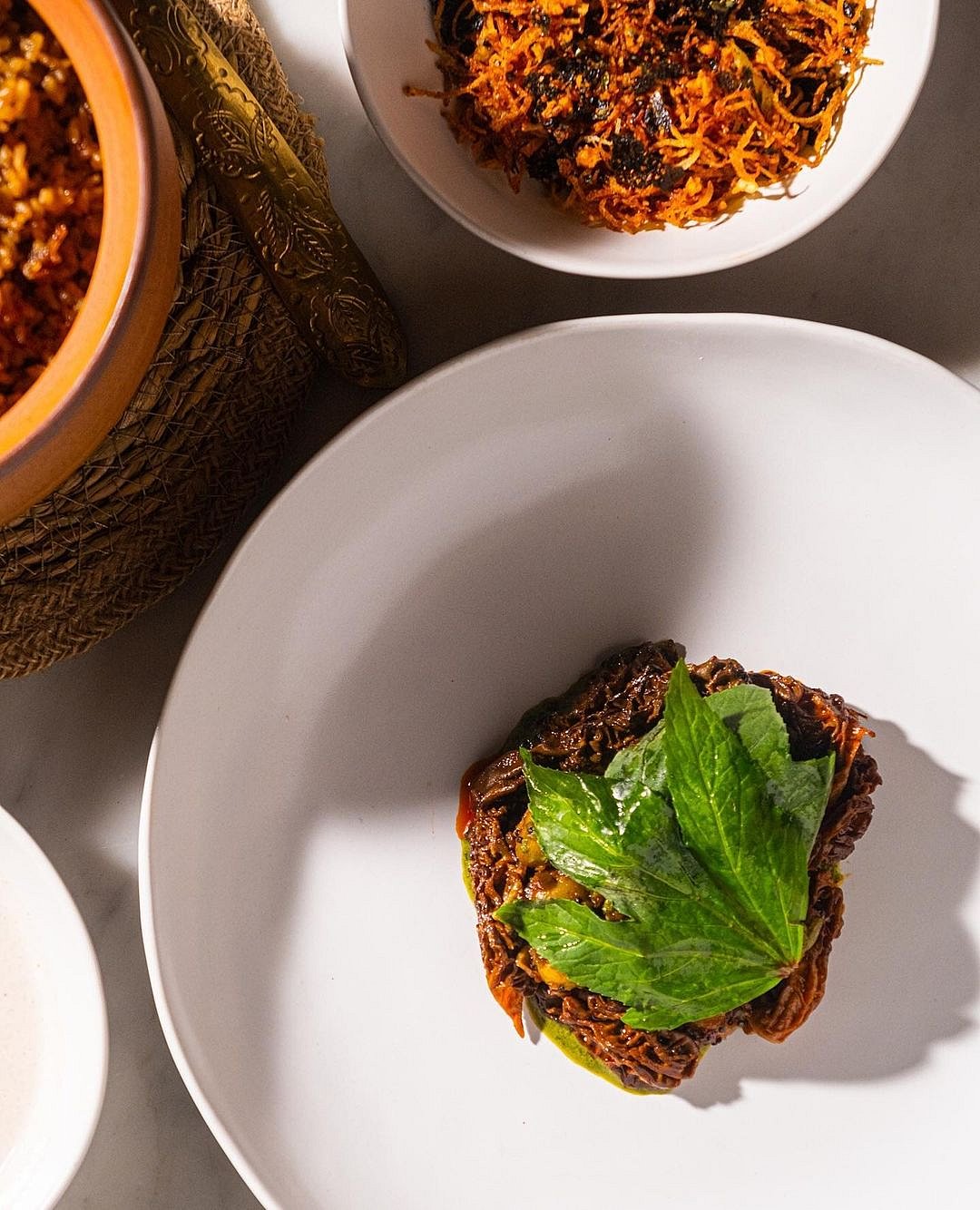 Orel mushrooms with jakhiya gutti aloo and gongura at Masque