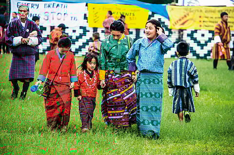 Children wearing Bhutan's traditional attire, Kira