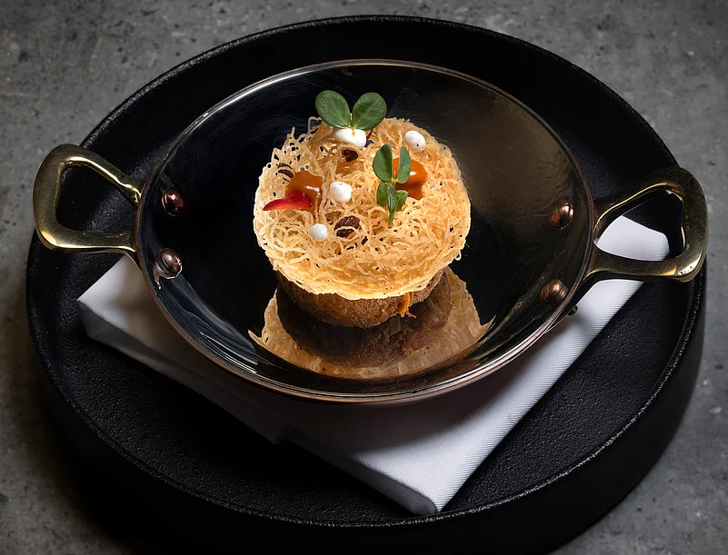 Smoked duck shami, crispy sevai, and barberry chutney