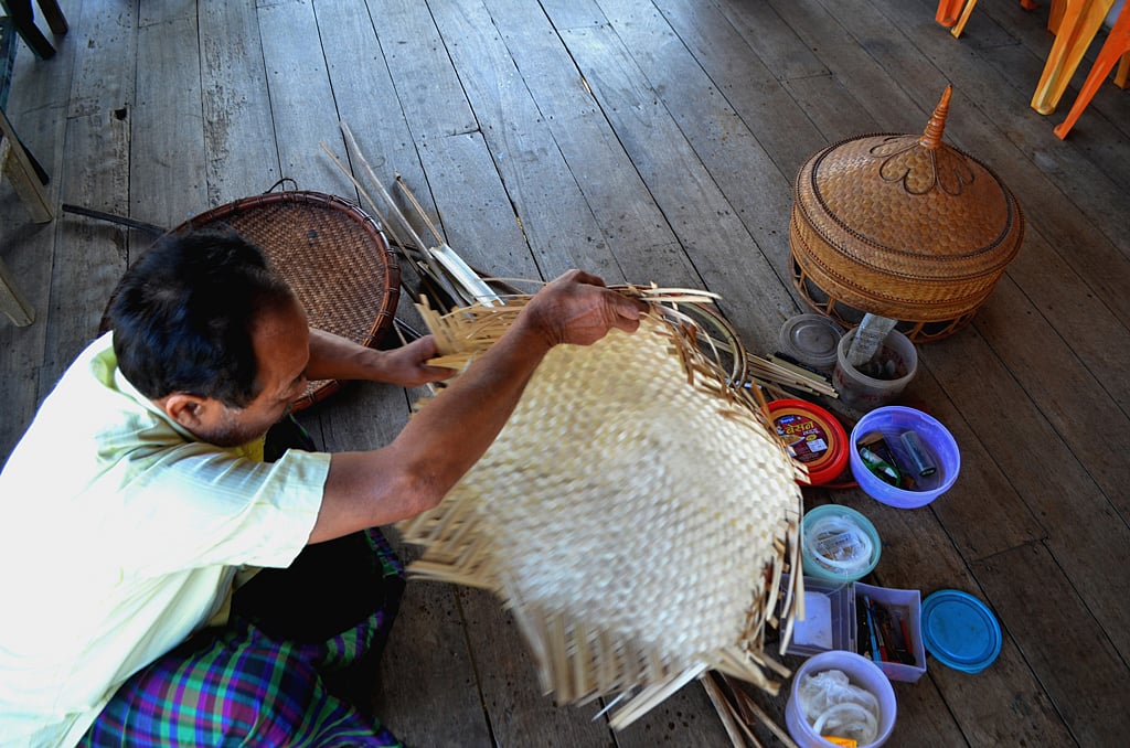 Chowkim Singpho making the upper portion of a phon