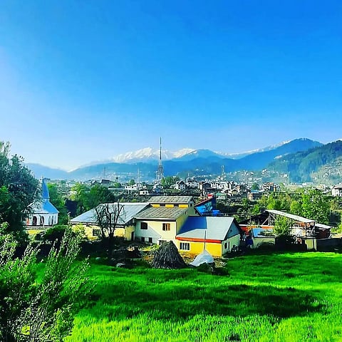 Lush greenery surrounds the entire town