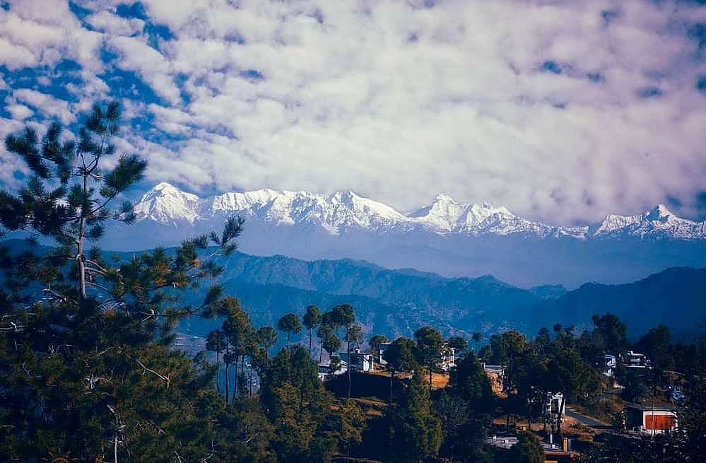 The lofty peaks from Kasar Devi temple