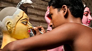 Shutterstock : An idol of Durga being worked on at Kumartuli