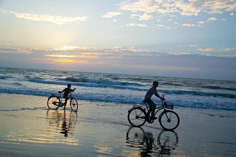 Kids playing at a beach - DepositPhotos