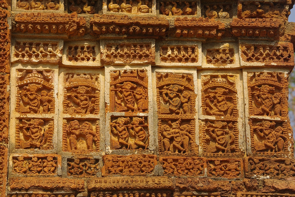 Intricate carvings on terracotta bricks 