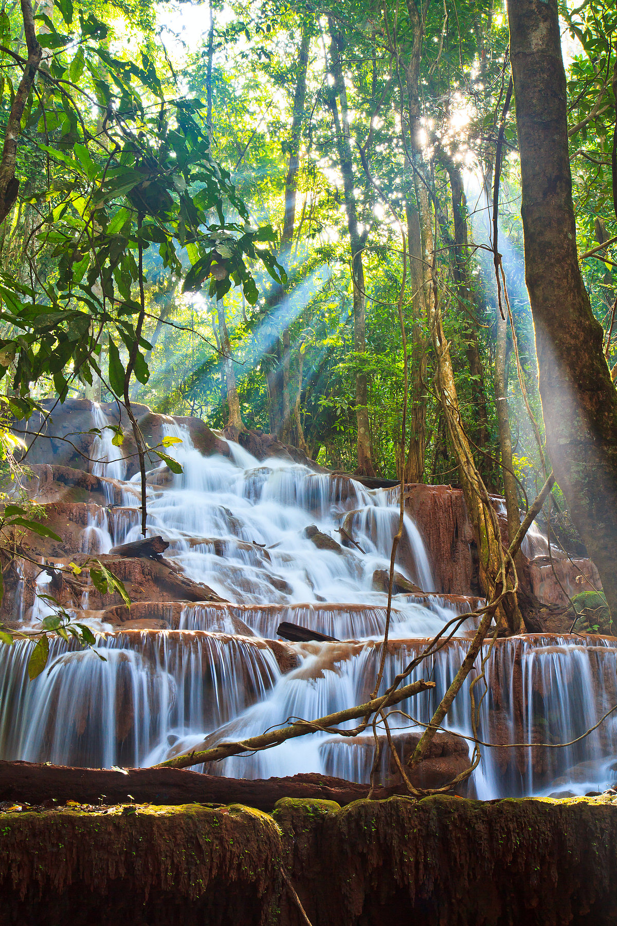 Depositphotos : A waterfall in Laos, one of the places where Indian currency prevails over the local