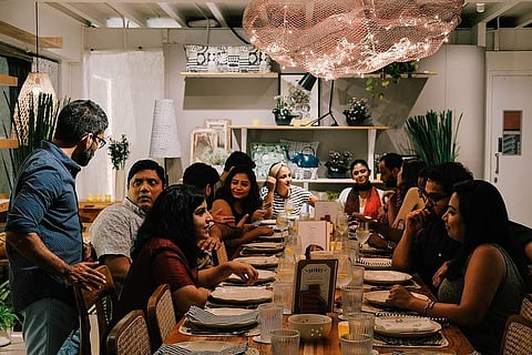 A Symbai pop-up in Mumbai, with community-style long tables that bring people together