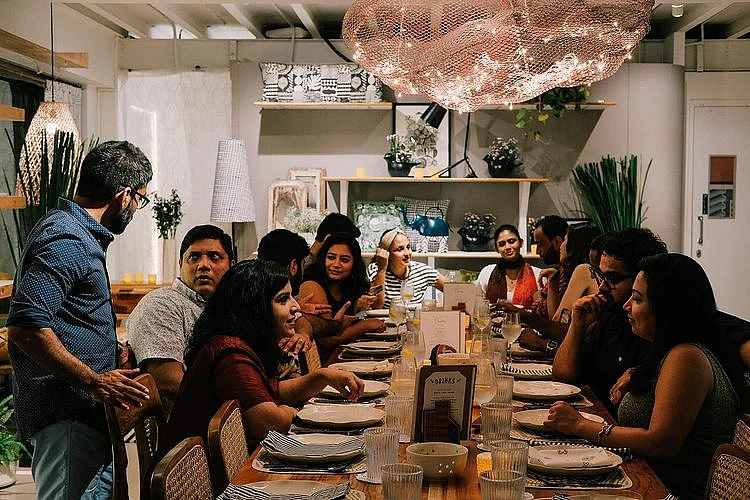 A Symbai pop-up in Mumbai, with community-style long tables that bring people together