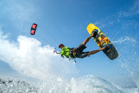 A kitesurfer in action