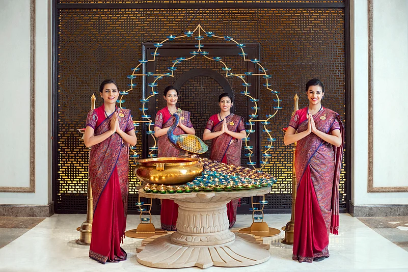 Ritual lamp lighting at Taj Palace