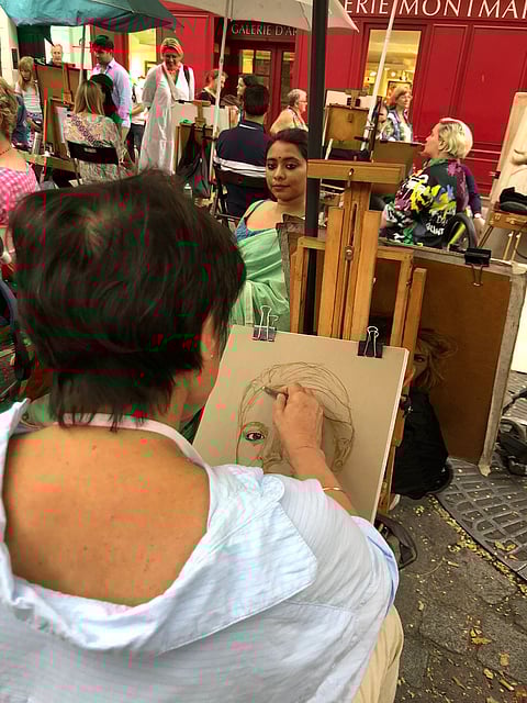 Getting a portrait done in Paris
