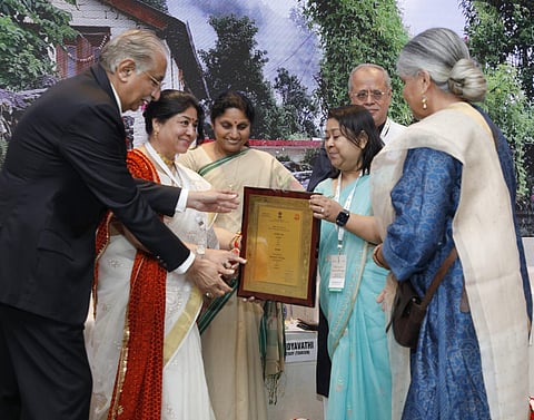 Smt Poonam Chand, Addl Director, Uttarakhand Tourism and Mallika Virdi receiving the Award.