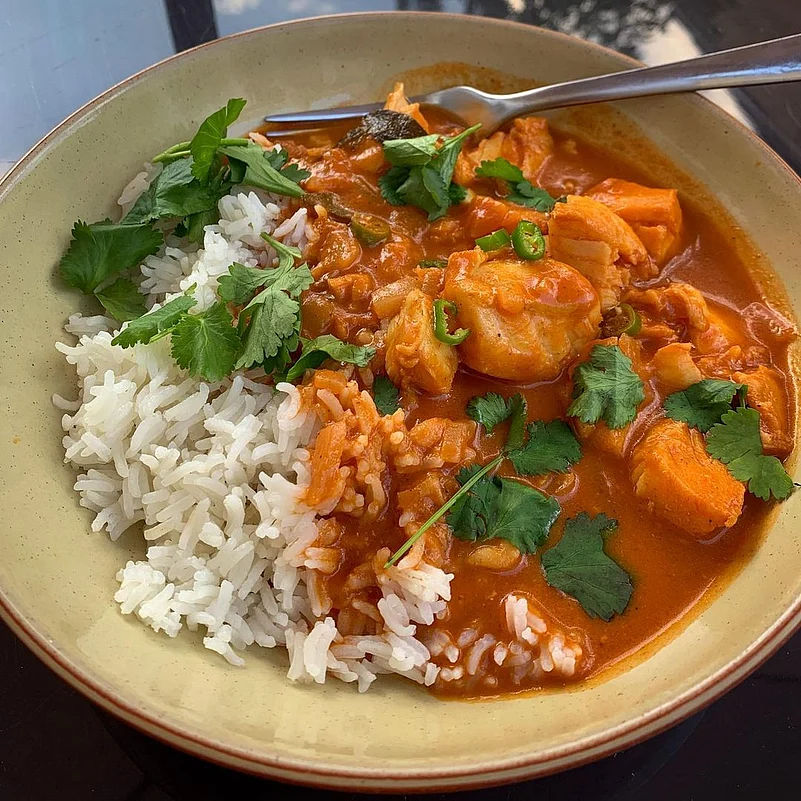 Goan fish curry served with rice