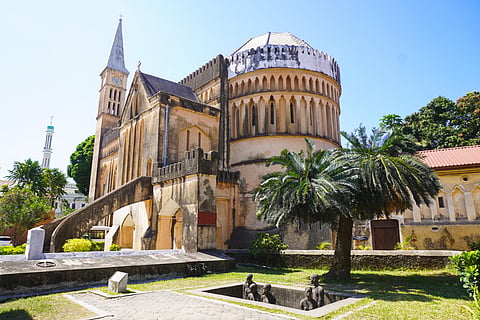 Anglican Cathedral with historical monuments beside it, Zanzibar Stone town
