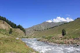 The Kishan Ganga river cuts through verdant valleys