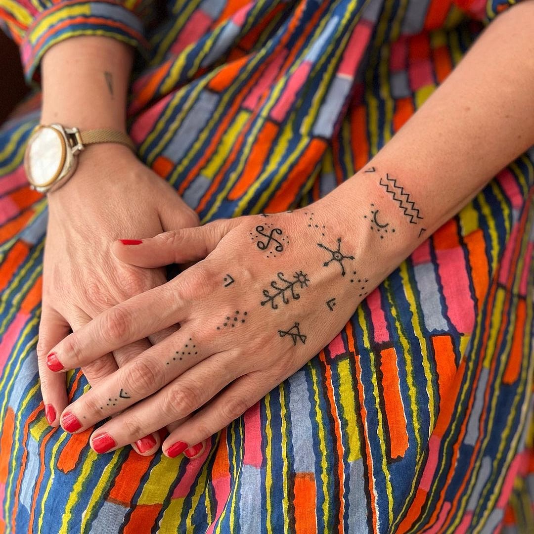 A hand poke tattoo design