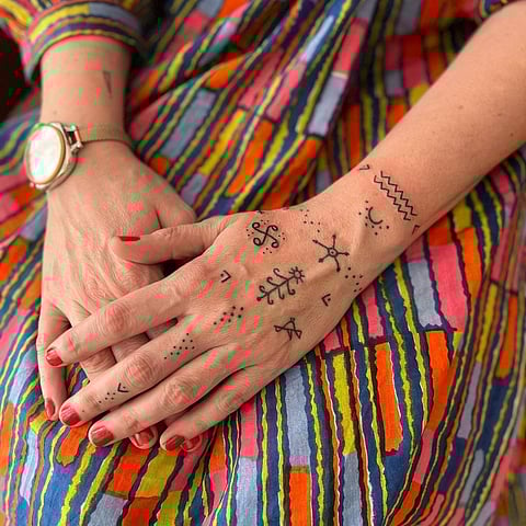 A hand poke tattoo design