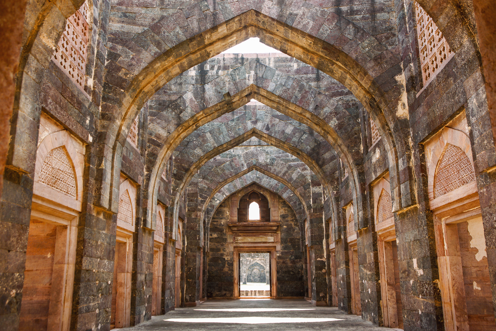Low angle Interior view of arches and columns from Hindola Mahal