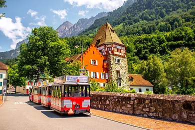 Shutterstock : The famous red house in Vaduz city, Liechtenstein