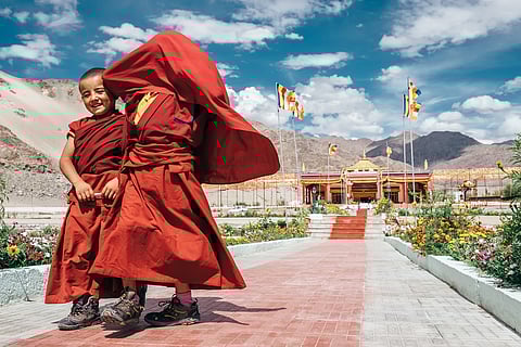 Two boy monks outside the Thiksey Monastery