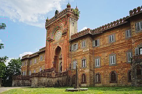 The main entrance with clock of Sammezzano Castle in Tuscany
