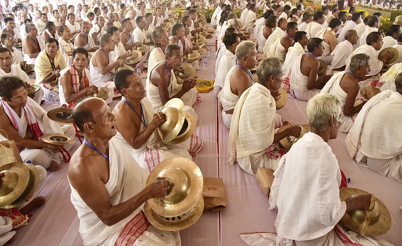 Devotees perform devotional songs at Auniati Satra, North Guwahati