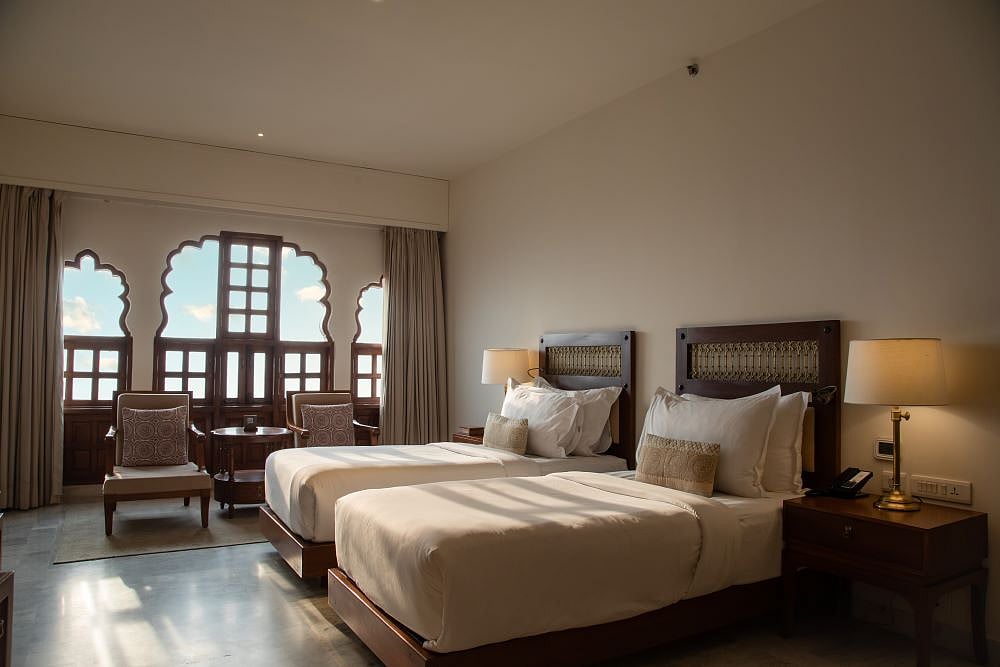 The interiors are embellished with elements of Rajasthani architecture such as  jharokhas 